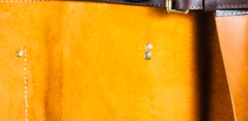 Zoomed in Handcrafted Leather Compass Hald Apron Imported from Colombia